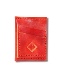 Red leather wallet featuring two external pockets made by Gy Crafts.